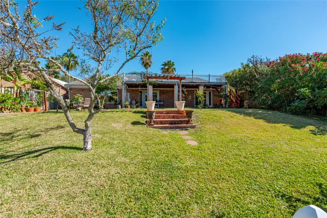 a view of a swimming pool with a lounge chairs