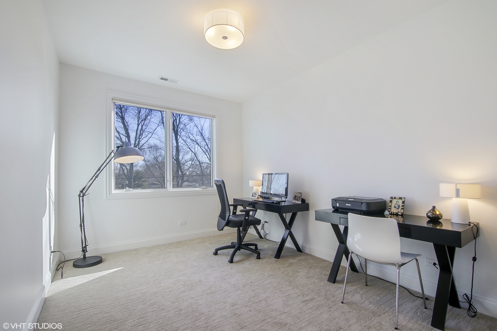 435 Ridge Road Highland Park, IL 60035 - Photo 20 of 30 a view of a workspace with furniture and a window