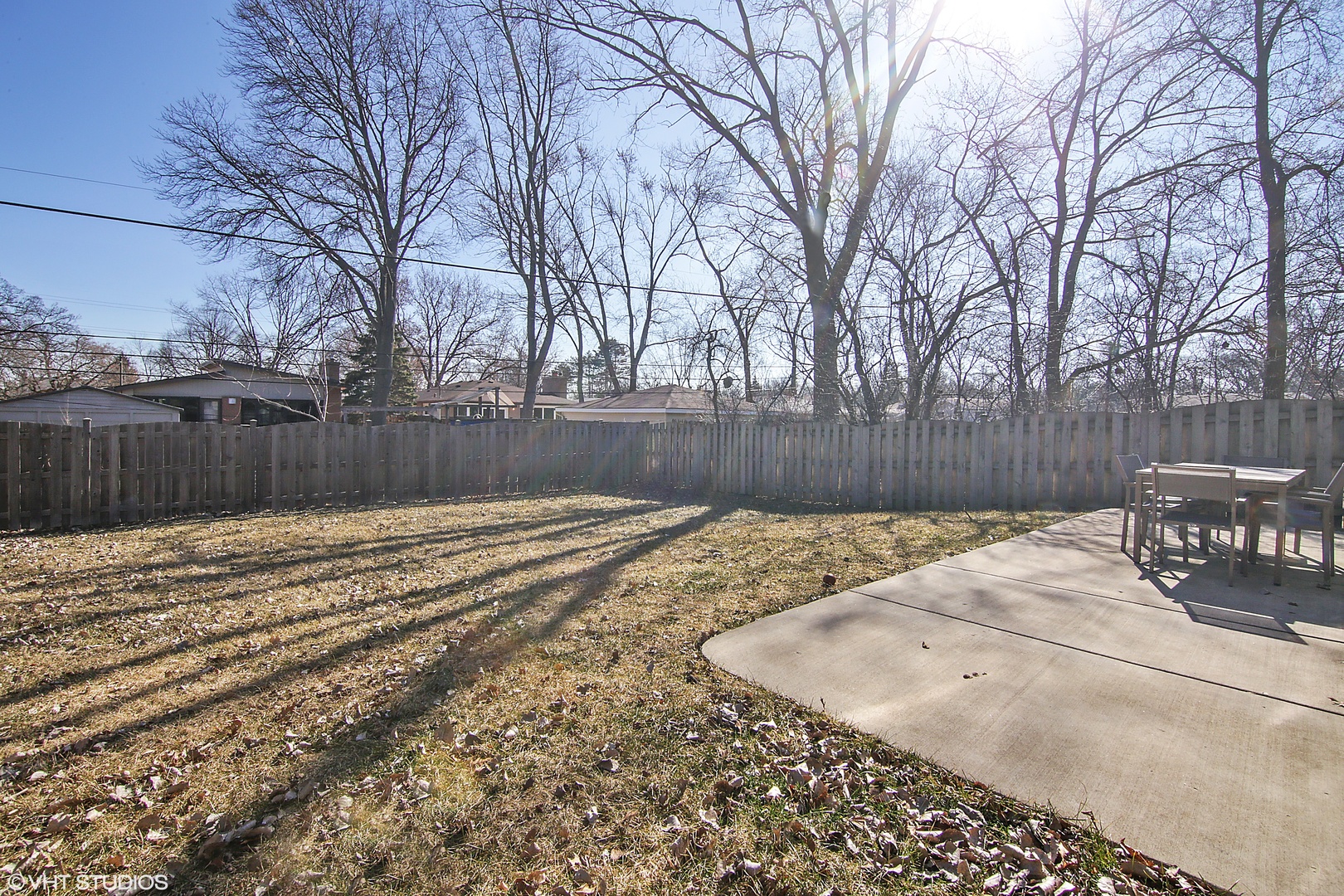 435 Ridge Road Highland Park, IL 60035 - Photo 30 of 30 a view of a backyard with wooden fence