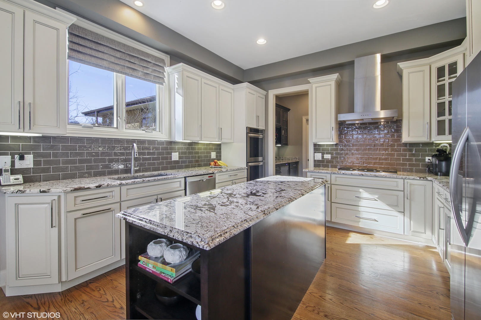 435 Ridge Road Highland Park, IL 60035 - Photo 5 of 30 a kitchen with granite countertop a sink stove and cabinets