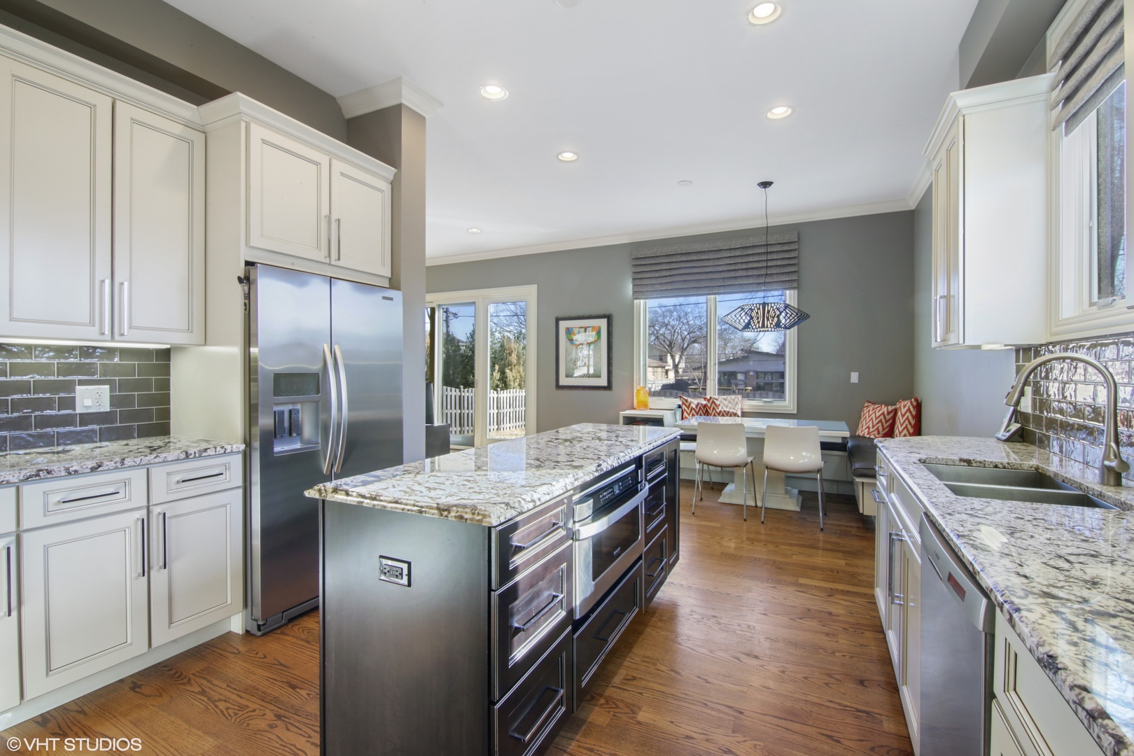 435 Ridge Road Highland Park, IL 60035 - Photo 6 of 30 a kitchen with stainless steel appliances granite countertop a sink stove and refrigerator