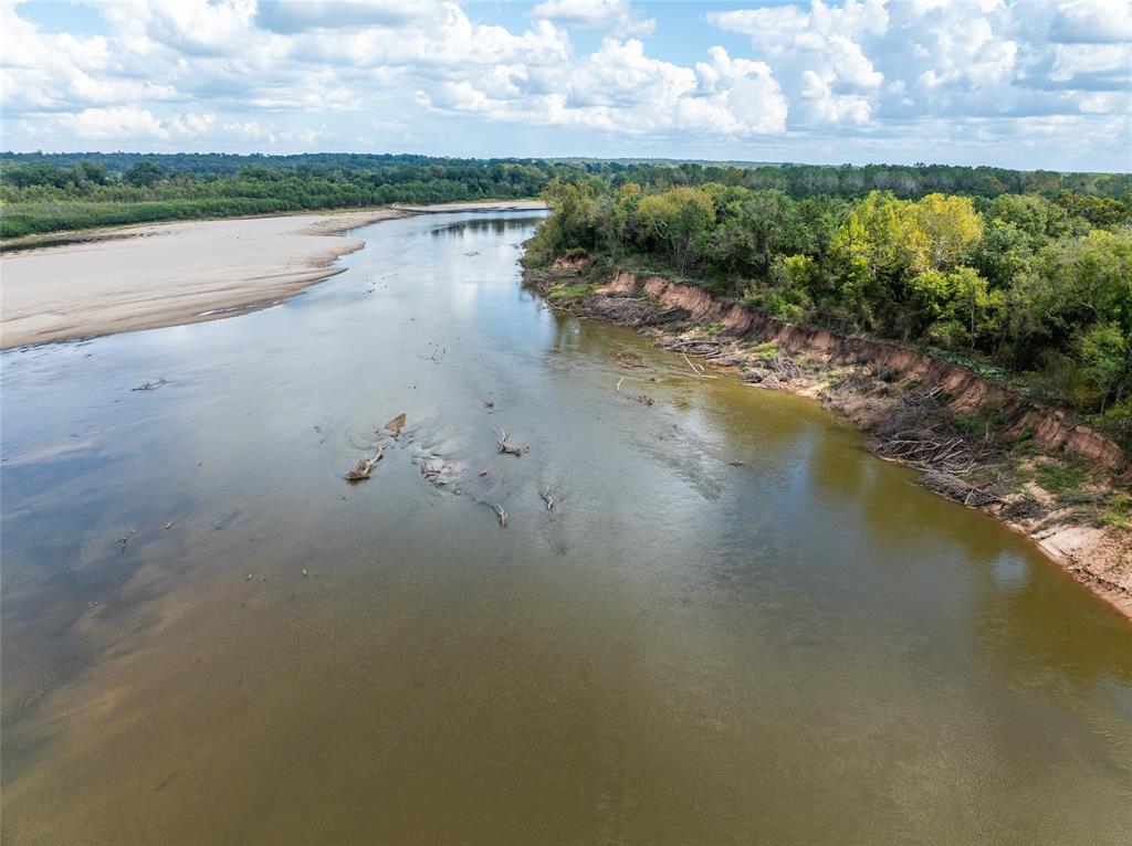 0 Fm 410 Detroit, TX 75436 - Photo 13 of 40 a view of a lake with houses in the back