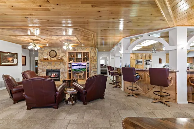 a bedroom with a bed and a mirror