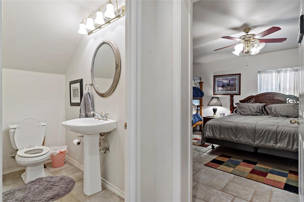 0 Fm 410 Detroit, TX 75436 - Photo 29 of 40 a bedroom with a bed and a mirror