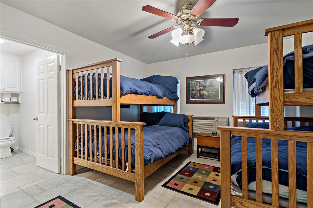 0 Fm 410 Detroit, TX 75436 - Photo 31 of 40 a bedroom with furniture and a window