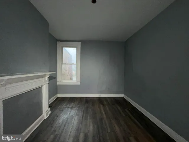 a bathroom with a bathtub a toilet and a shower