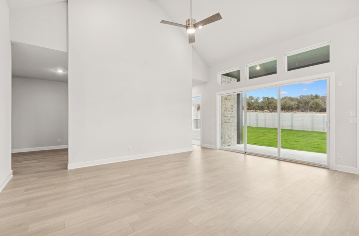 2005 Sundown Trail Georgetown, TX 78628 - Photo 7 of 18 a view of an empty room with glass door