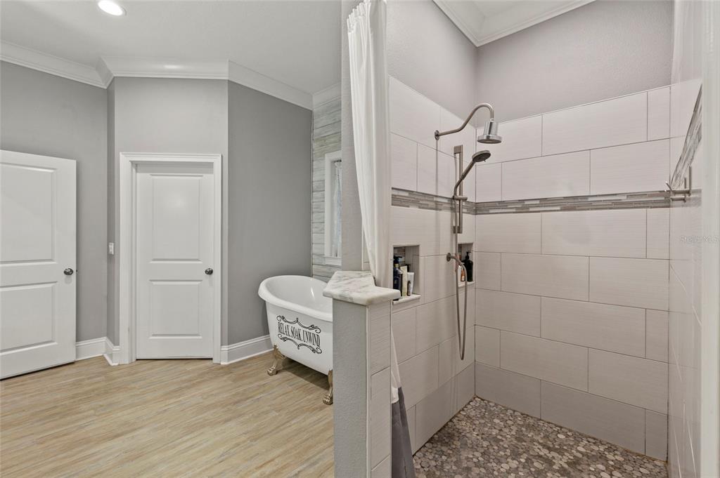 15710 Colding Loop Wimauma, FL 33598 - Photo 16 of 41 a bathroom with a sink and a mirror