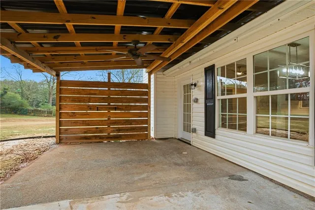 a view of an empty room with a balcony