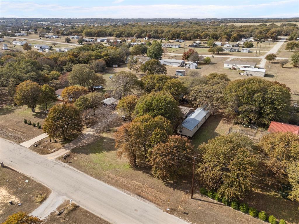 353 Prairie Lane Azle, TX 76020 - Photo 33 of 36 an aerial view of residential houses with outdoor space