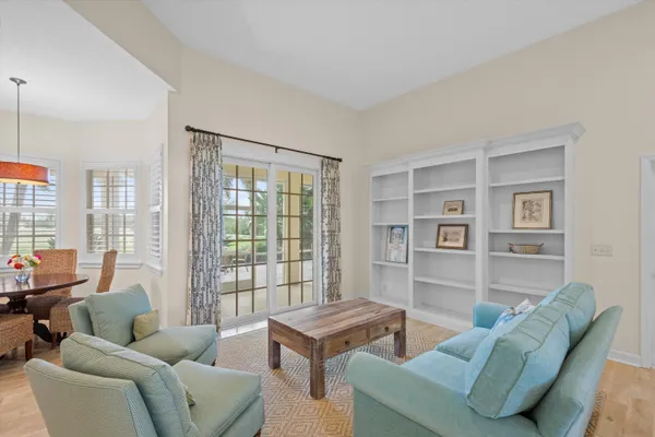 a living room with furniture and a couch