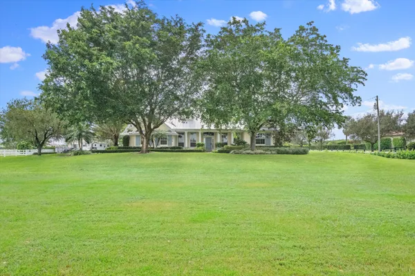 a view of a swimming pool and a lake