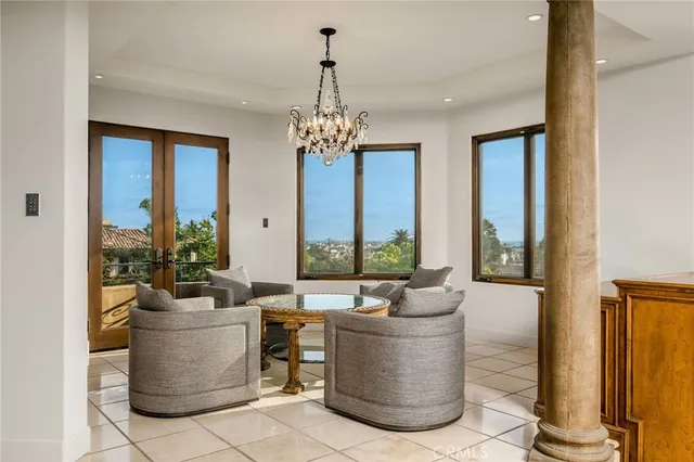 a view of a chairs and table in the patio