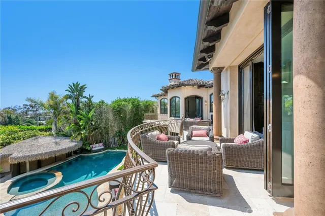 a view of a livingroom with furniture window and wooden floor