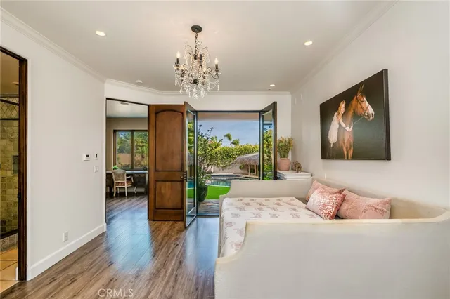 a living room with furniture fireplace and flat screen tv