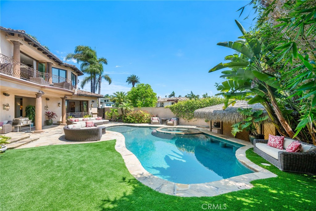 215 South Poinsettia Avenue Manhattan Beach, CA 90266 - Photo 54 of 64 a view of a house with swimming pool and sitting area