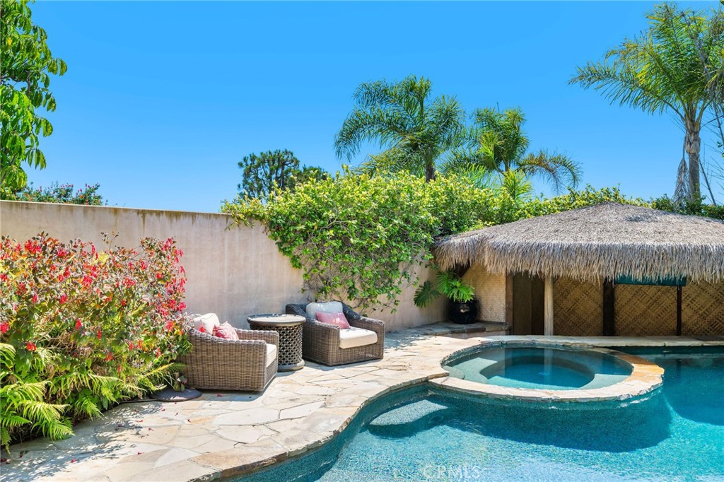 215 South Poinsettia Avenue Manhattan Beach, CA 90266 - Photo 55 of 64 a backyard of a house with seating space