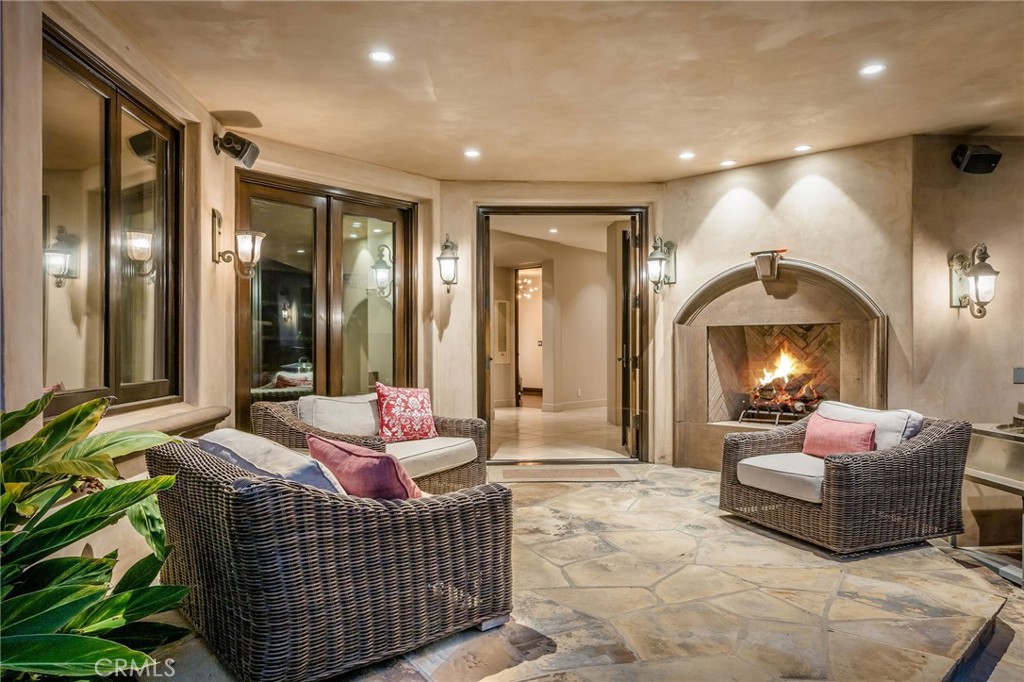 215 South Poinsettia Avenue Manhattan Beach, CA 90266 - Photo 58 of 64 a living room with furniture and a fireplace