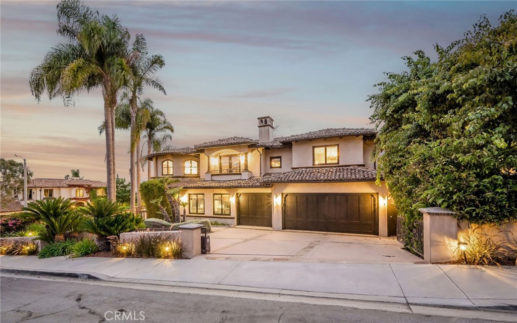 215 South Poinsettia Avenue Manhattan Beach, CA 90266 - Photo 61 of 64 a front view of a house with a yard