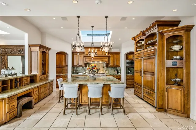 a living room with fireplace furniture and a fireplace