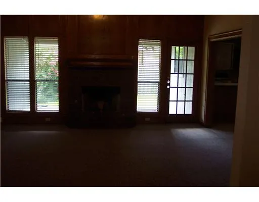 a living room with a black gate