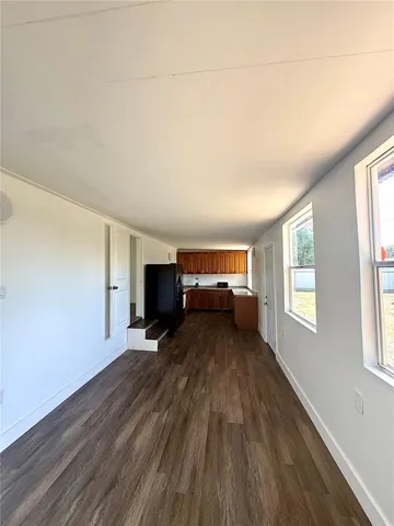 a view of livingroom with furniture and wooden floor