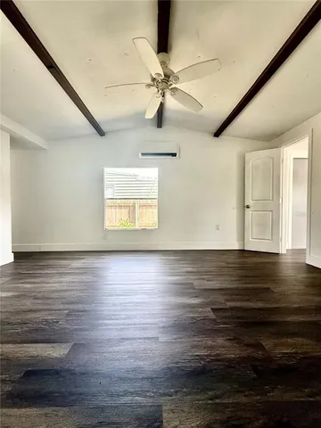 a view of an ocean window and wooden floor