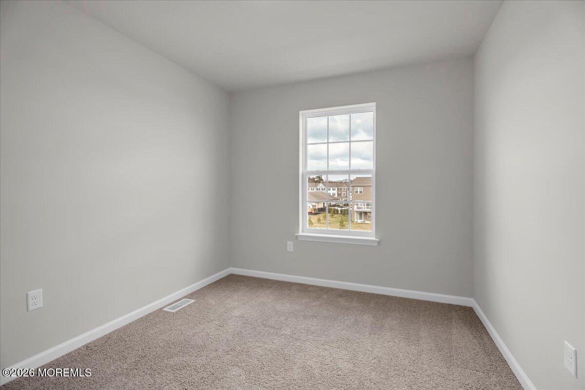 220 Sandy Rdg Road Sicklerville, NJ 08081 - Photo 16 of 24 an empty room with a window