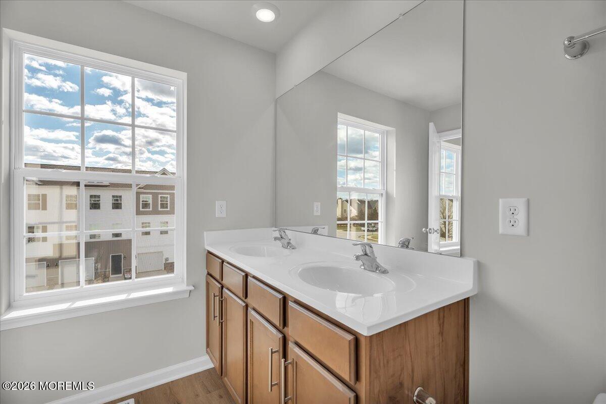 220 Sandy Rdg Road Sicklerville, NJ 08081 - Photo 18 of 24 a bathroom with a sink and a mirror