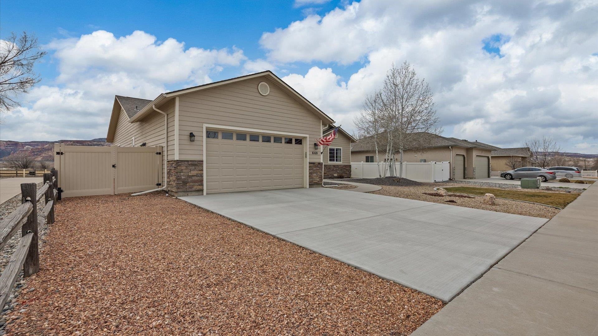 640 Beech Avenue Fruita, CO 81521 - Photo 2 of 34 a view of a house with a backyard