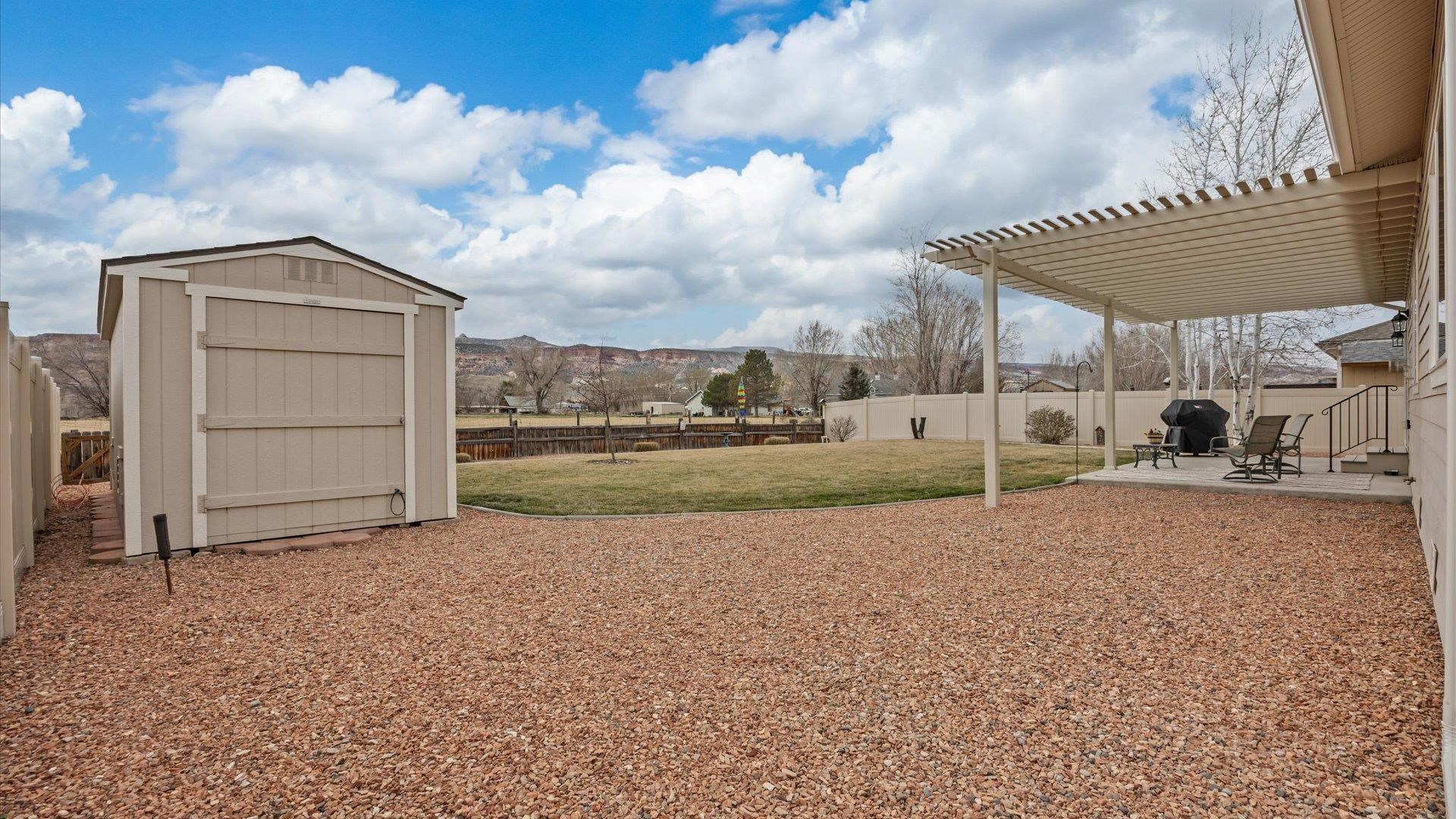 640 Beech Avenue Fruita, CO 81521 - Photo 29 of 34 a view of a house with a backyard