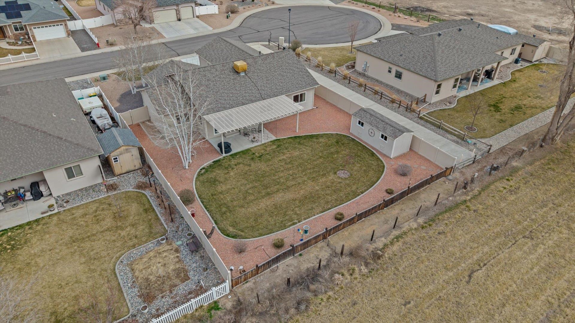 640 Beech Avenue Fruita, CO 81521 - Photo 32 of 34 an aerial view of a house with a swimming pool