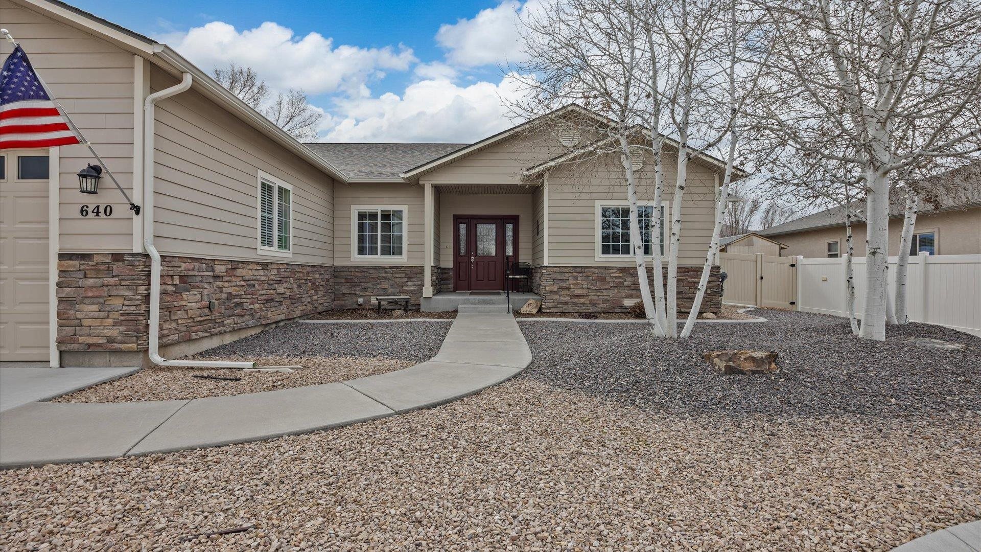640 Beech Avenue Fruita, CO 81521 - Photo 8 of 34 a front view of a house with garden