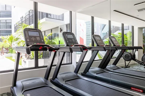 a view of a room with gym equipment