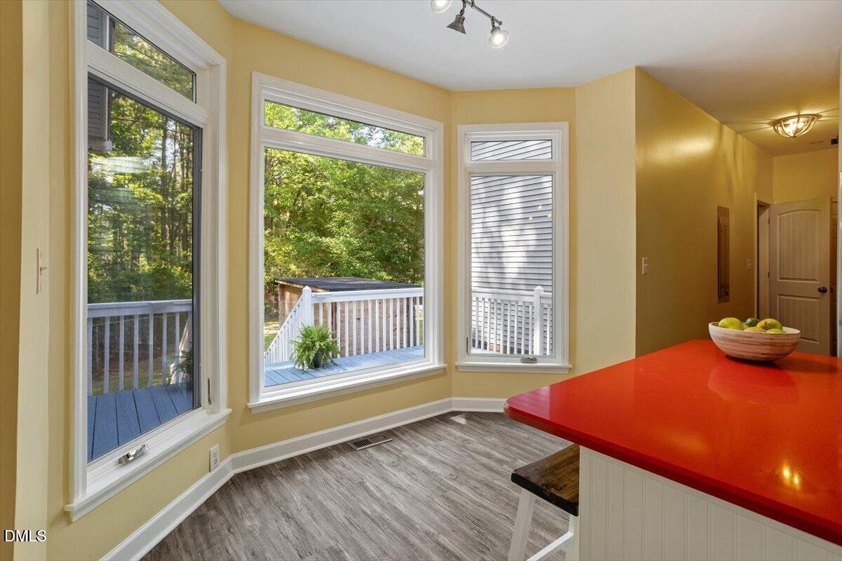 7505 Penny Road Raleigh, NC 27606 - Photo 16 of 35 a room with window and stairs