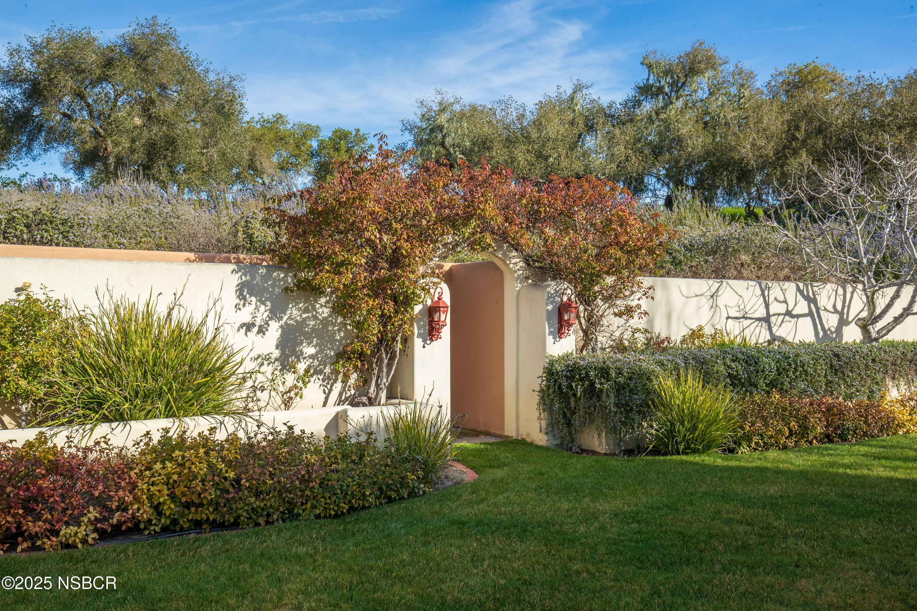 9985 Alisos Canyon Road Los Alamos, CA 93440 - Photo 24 of 25 a garden with trees in front of it