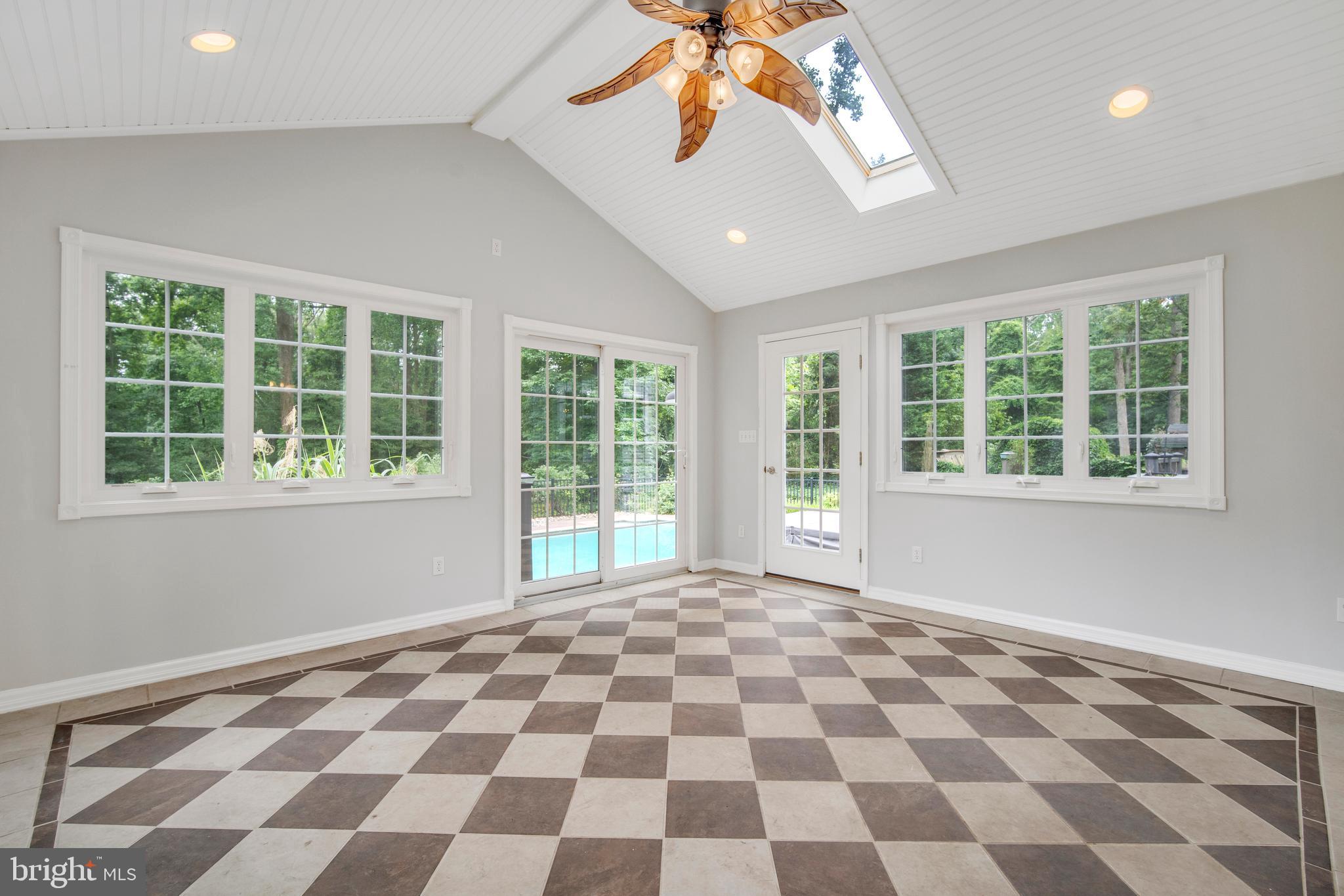 629 Shore Acres Road Arnold, MD 21012 - Photo 10 of 48 Surrounded by sunlight and pool views