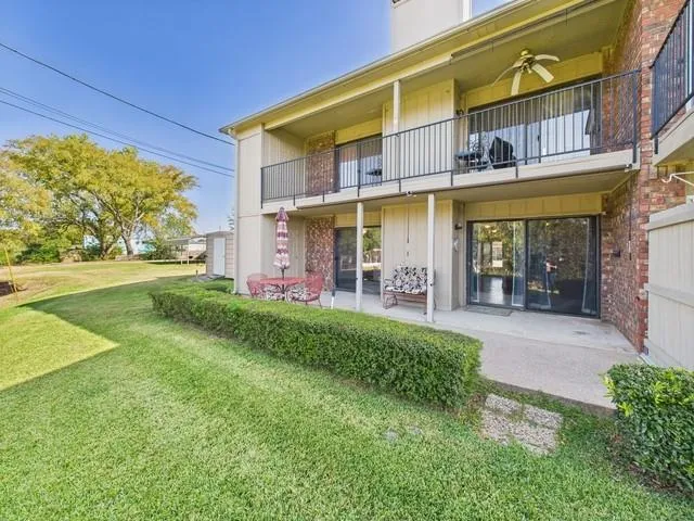 a view of a building with a garden