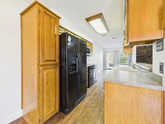 a view of a kitchen interior of the house
