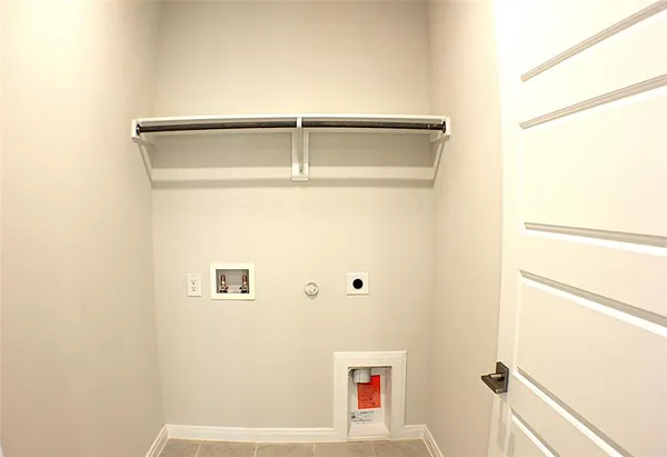 a view of a livingroom with a ceiling fan and window