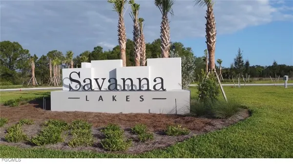 a building with trees in the background