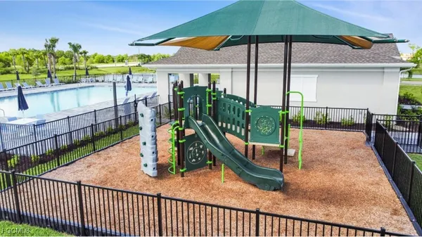 a view of a park with a slide