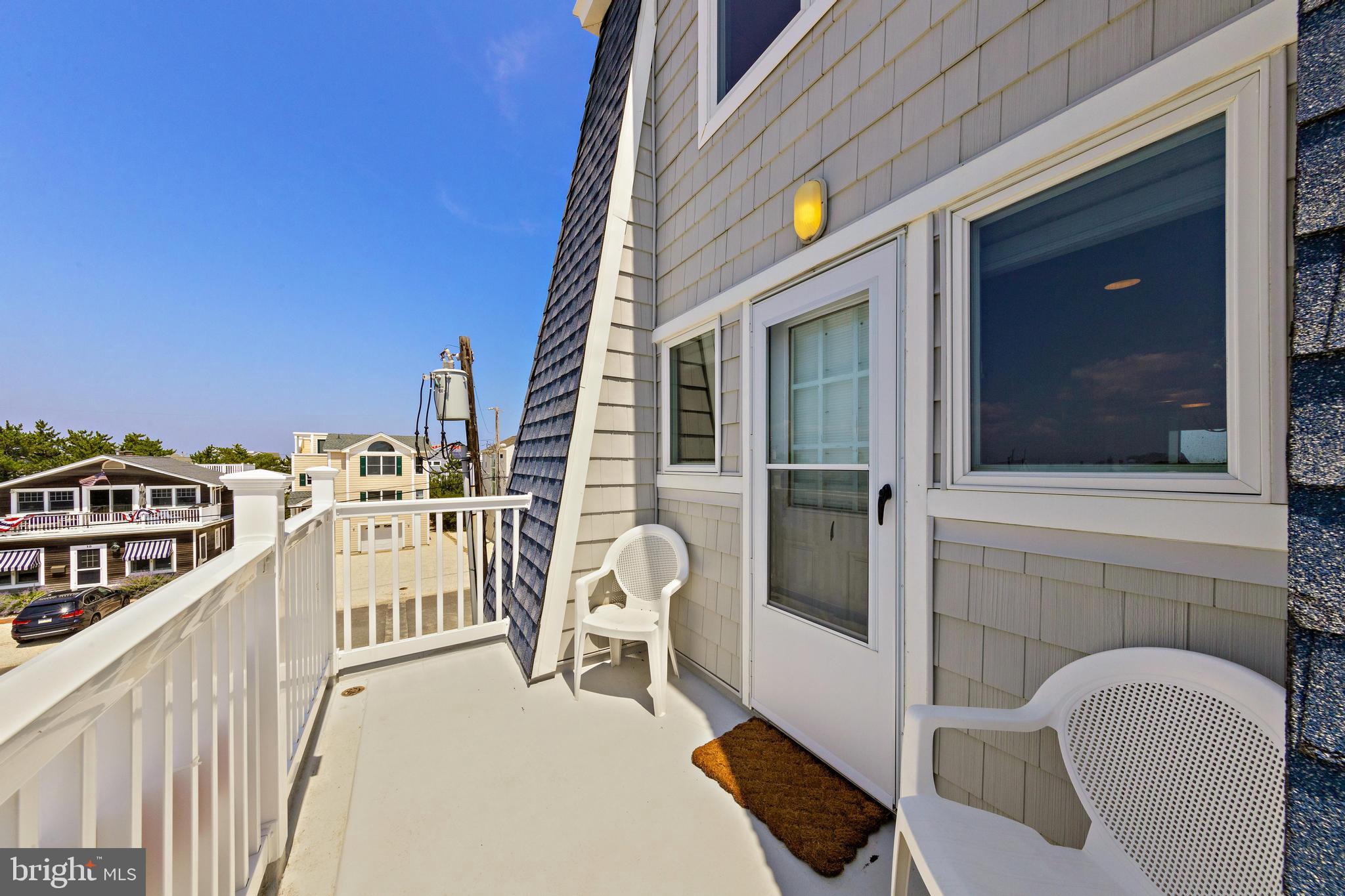 1 Centre Street, Unit 1 Beach Haven, NJ 08008 - Photo 37 of 40 a view of a balcony with furniture