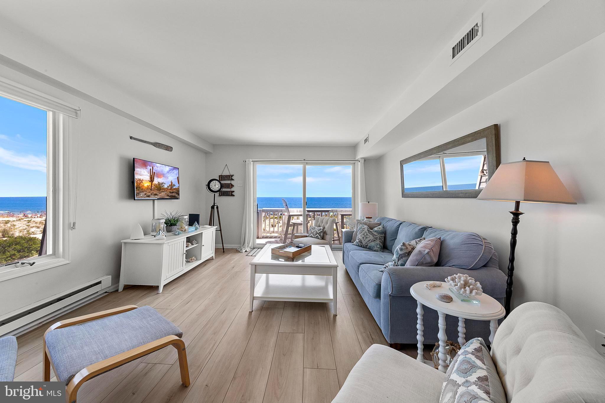 1 Centre Street, Unit 1 Beach Haven, NJ 08008 - Photo 5 of 40 a living room with furniture and window