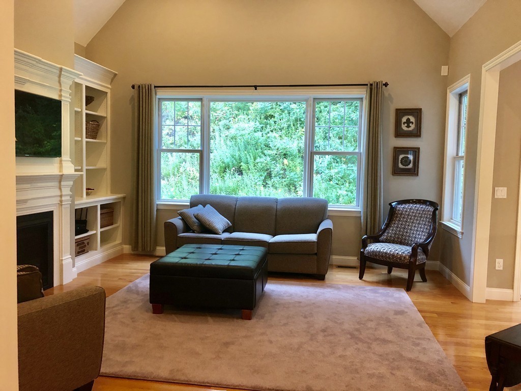 6 Adams Farm Road, Unit 6 Shrewsbury, MA 01545 - Photo 16 of 38 a living room with furniture and a large window