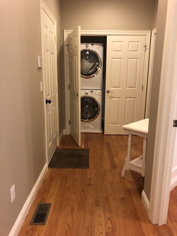 6 Adams Farm Road, Unit 6 Shrewsbury, MA 01545 - Photo 20 of 38 a view of a hallway with washer and dryer