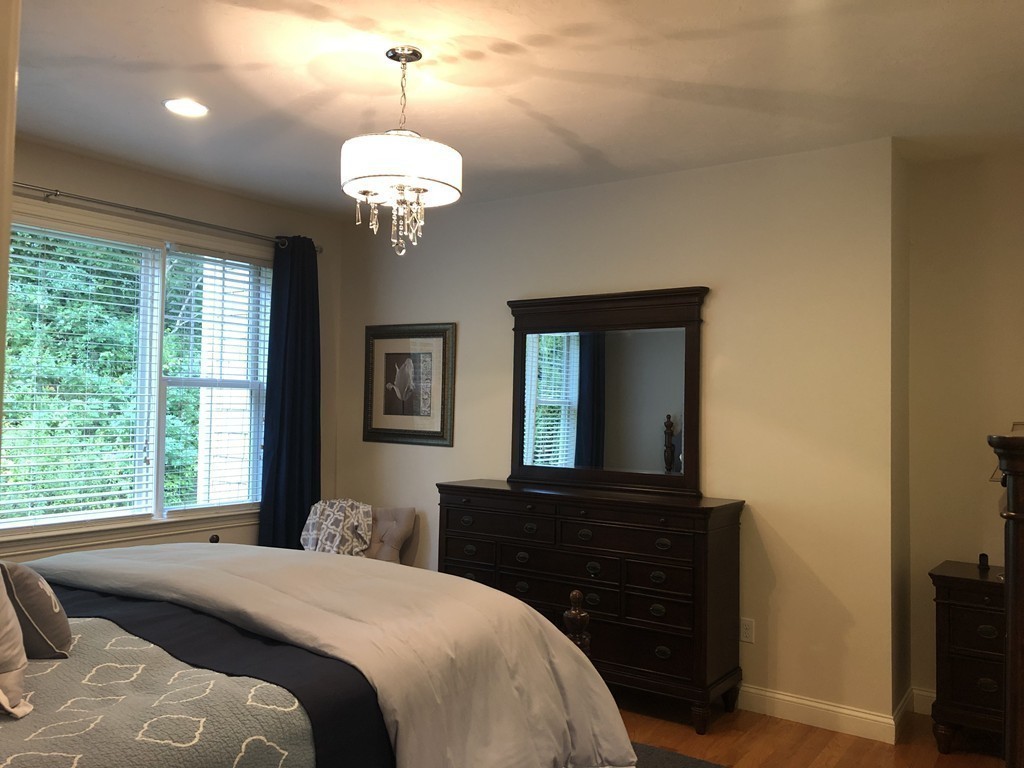 6 Adams Farm Road, Unit 6 Shrewsbury, MA 01545 - Photo 21 of 38 a bedroom with a bed and a window