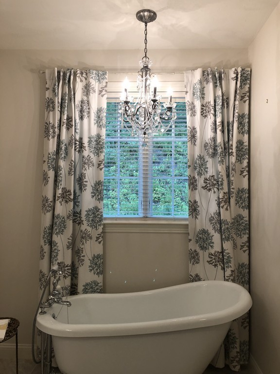 6 Adams Farm Road, Unit 6 Shrewsbury, MA 01545 - Photo 26 of 38 a bathroom with a bathtub and shower