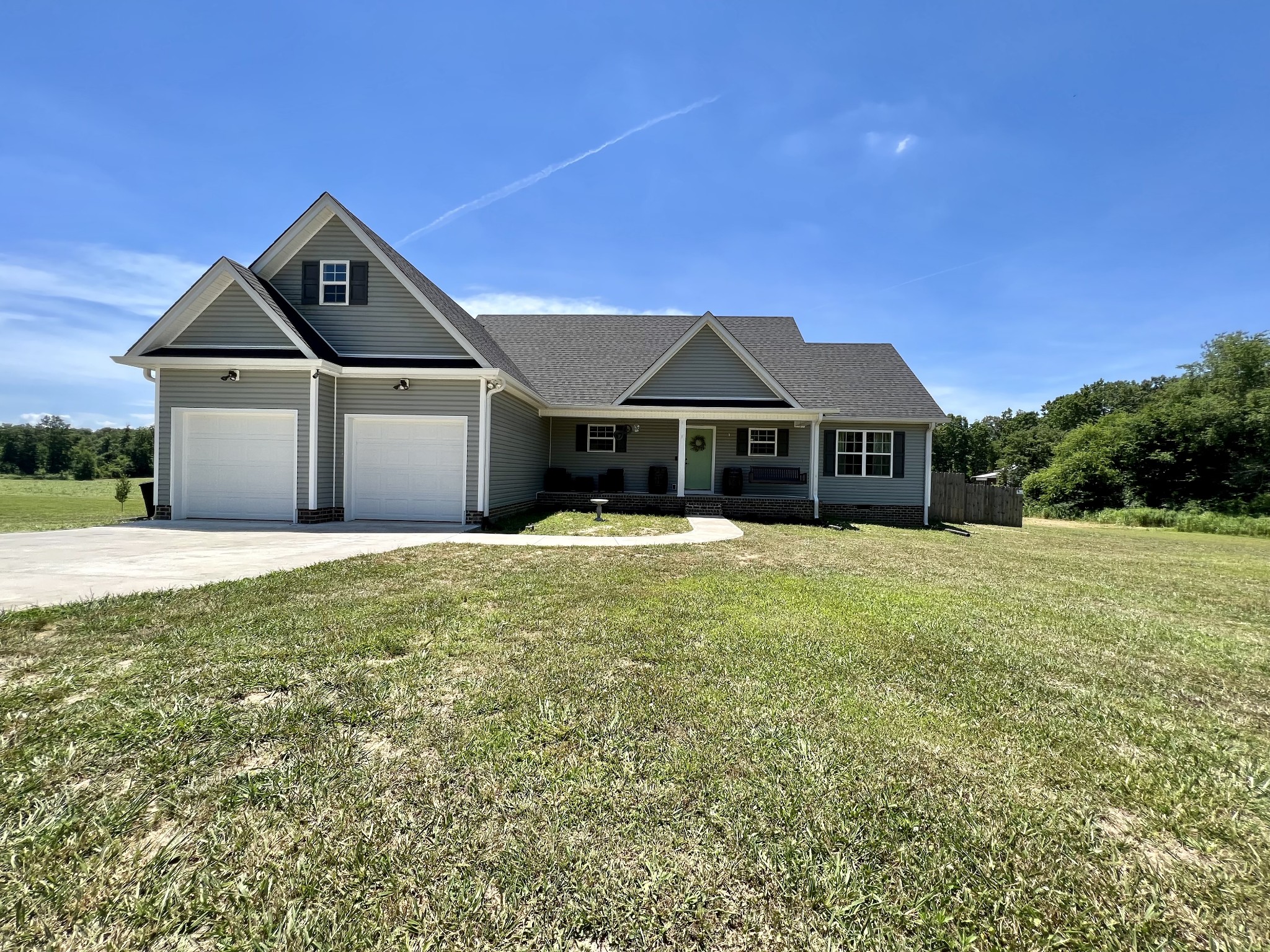 418 Taylor Road Manchester, TN 37355 - Photo 1 of 30 a front view of a house with a yard