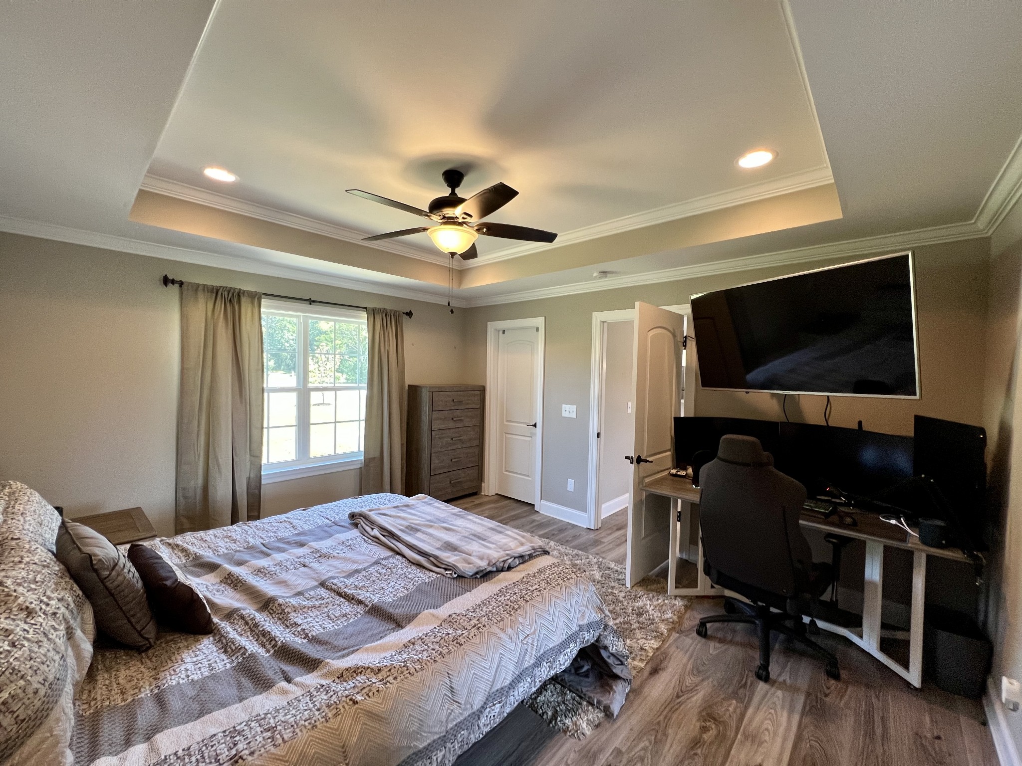 418 Taylor Road Manchester, TN 37355 - Photo 16 of 30 a bedroom with a bed and a flat screen tv